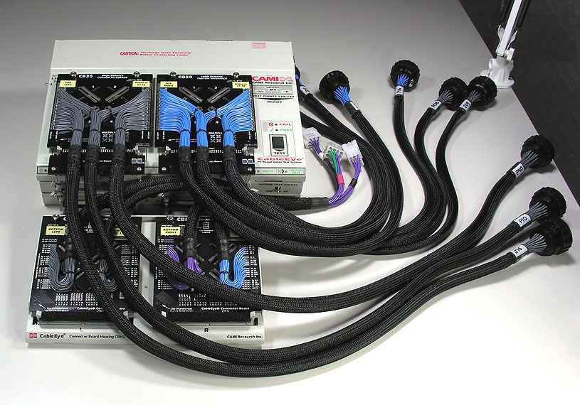 Custom adapter cables were mounted on two CB30 boards (top) and two CB8 boards (bottom).