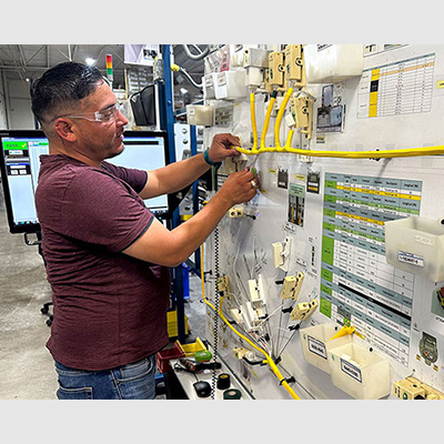 Harness tester being used to test large harness.