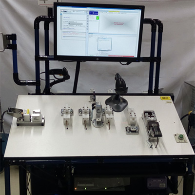 Harness tester and test interface panel with lock and release latches.